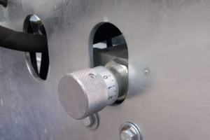 Manual floor conveyor control valve